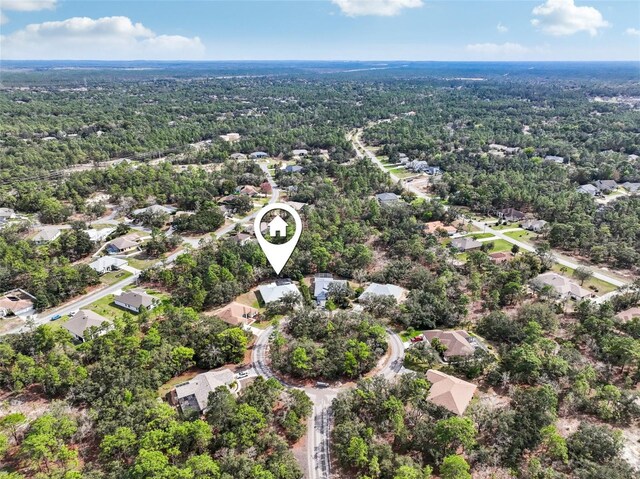 13 Witch Hazel Ct, Homosassa, FL 34446 - aerial overview of property's location featuring a forest and nearby suburban area