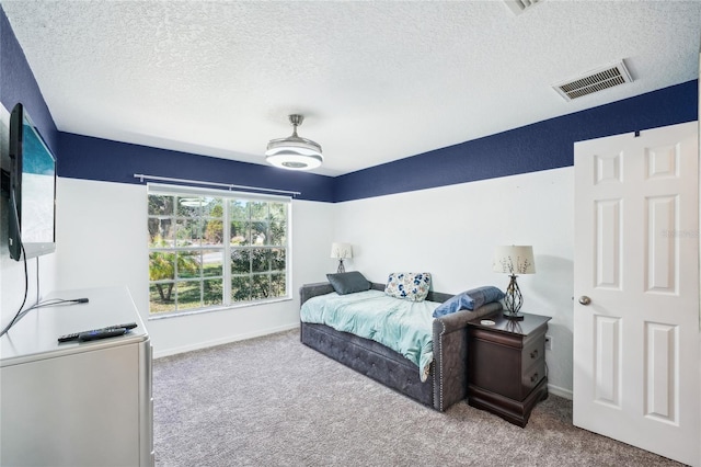 13 Witch Hazel Ct, Homosassa, FL 34446 - carpeted bedroom with a textured ceiling and baseboards