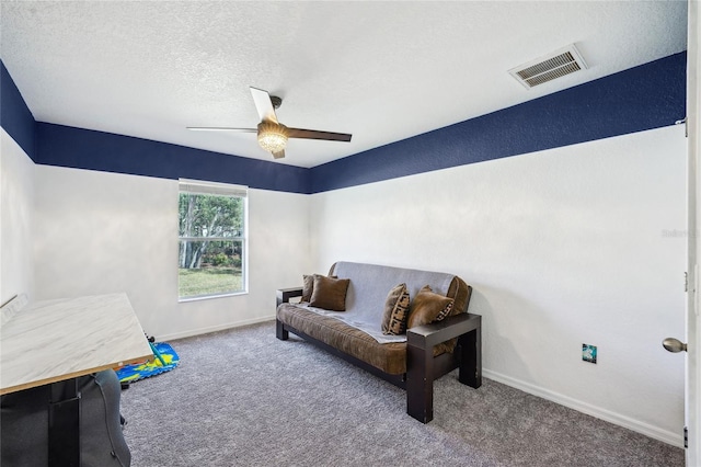 13 Witch Hazel Ct, Homosassa, FL 34446 - sitting room featuring carpet floors, a ceiling fan, baseboards, and a textured ceiling