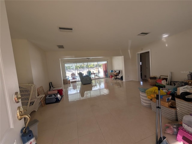 miscellaneous room featuring tile patterned flooring and visible vents