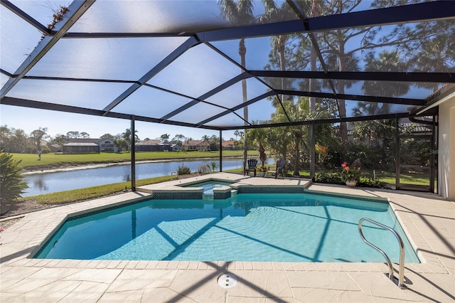 view of pool with a pool with connected hot tub, glass enclosure, a water view, and a patio