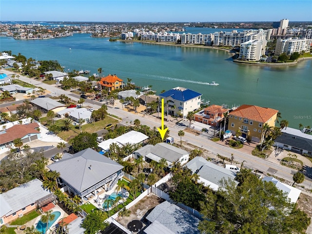 aerial view featuring a residential view and a water view