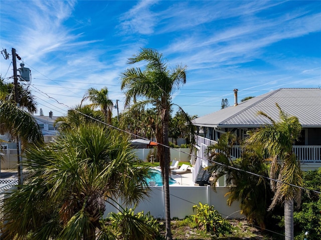 view of swimming pool with a fenced backyard and a fenced in pool