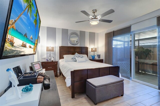 bedroom featuring light wood-style floors, access to exterior, ceiling fan, and wallpapered walls