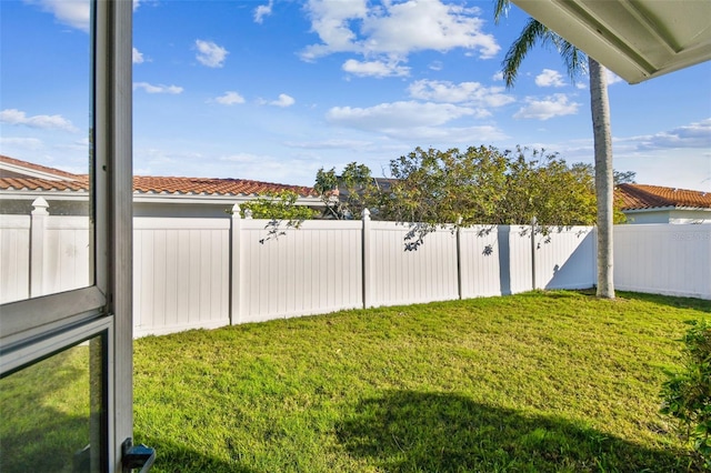 view of yard featuring a fenced backyard