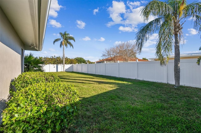 view of yard featuring a fenced backyard