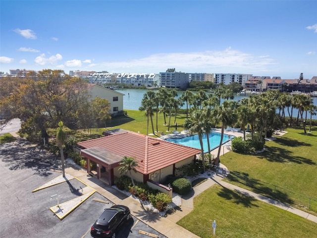 birds eye view of property featuring a water view