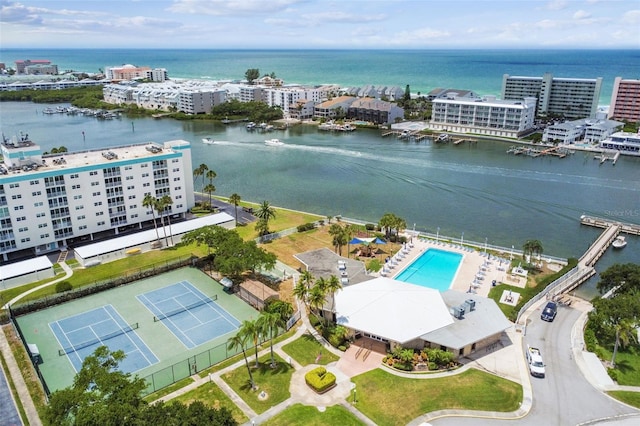 birds eye view of property featuring a water view and a view of city