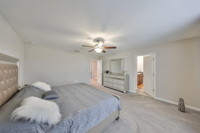 bedroom featuring light carpet, baseboards, visible vents, a ceiling fan, and a textured ceiling