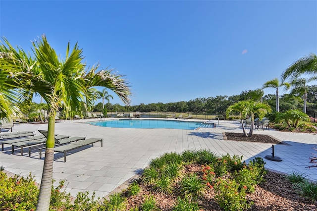 pool with a patio