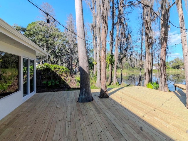 deck featuring a water view