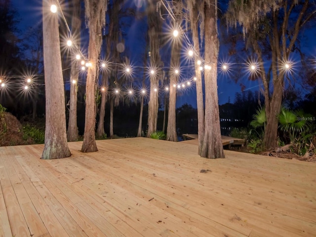 view of deck at twilight