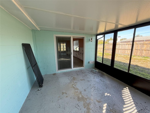 unfurnished sunroom with plenty of natural light