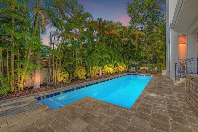 outdoor pool with a patio