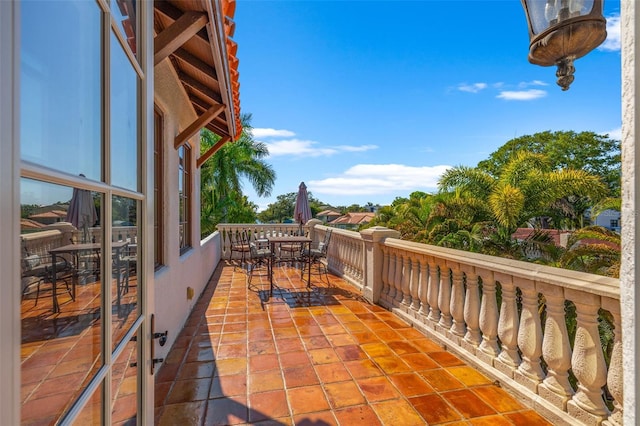 balcony featuring outdoor dining space