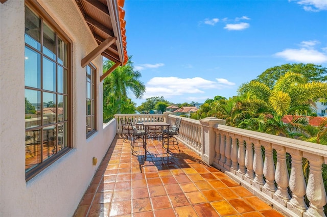 balcony featuring outdoor dining area