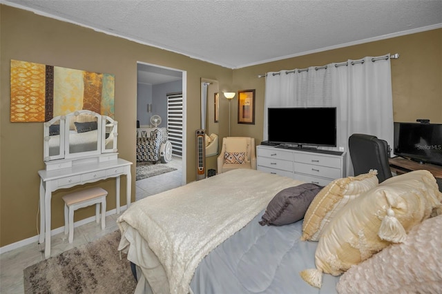 bedroom with ornamental molding, a textured ceiling, and baseboards