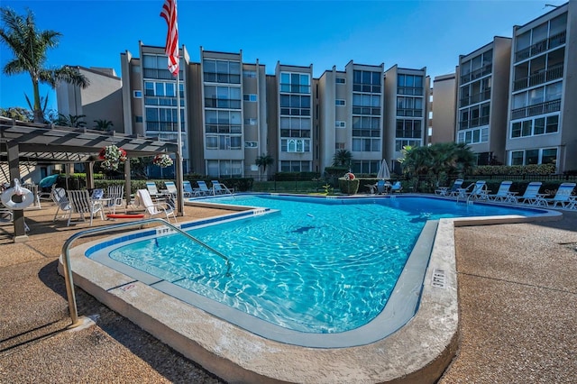 community pool featuring a patio area