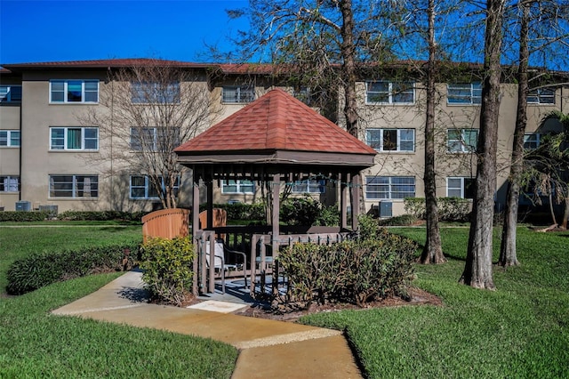 view of community with a yard and a gazebo