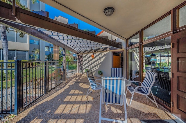 view of patio with fence and a pergola