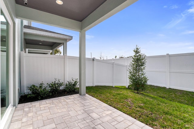 view of patio with a fenced backyard