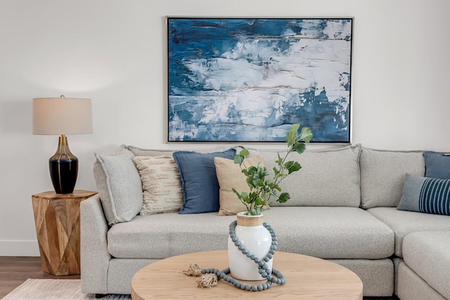 living room with wood finished floors and baseboards