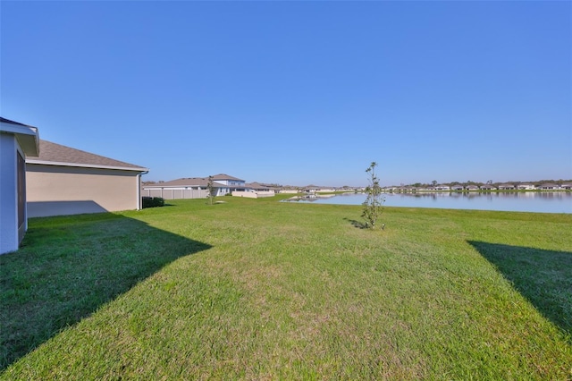 view of yard with a water view