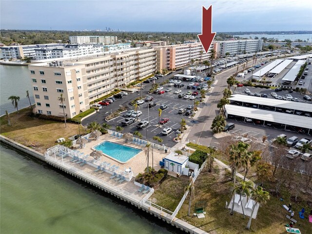 bird's eye view featuring a water view and a city view