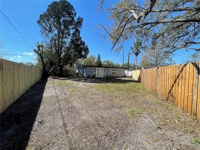 view of yard featuring a fenced backyard