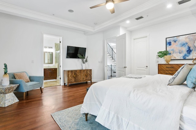 bedroom with ornamental molding, recessed lighting, visible vents, and wood finished floors