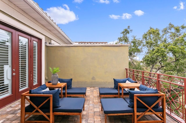 view of patio with an outdoor hangout area and french doors