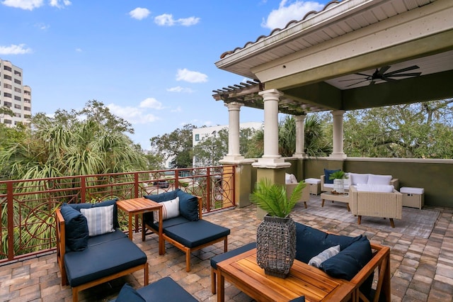 view of patio featuring outdoor lounge area and a ceiling fan