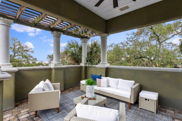 view of patio featuring ceiling fan, an outdoor hangout area, and a pergola