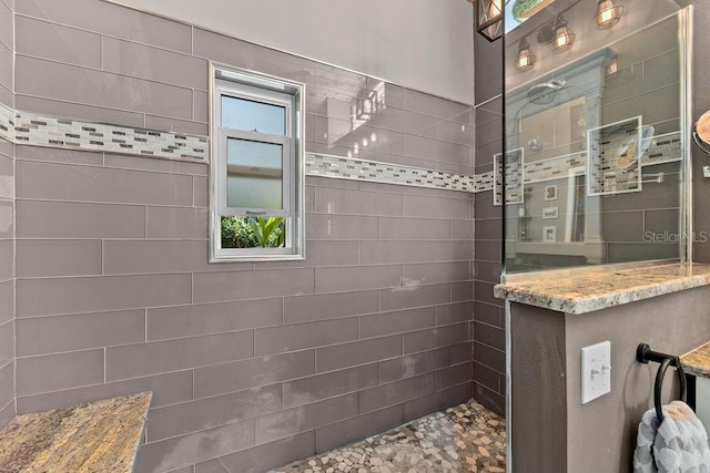 bathroom featuring a walk in shower