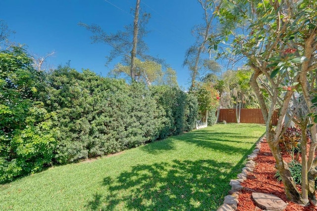 view of yard with fence