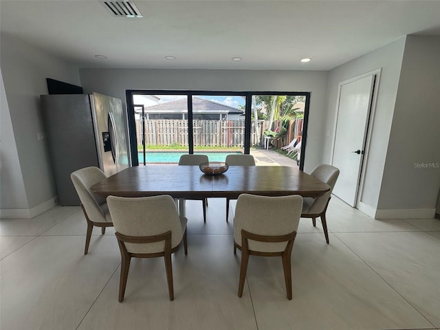 dining space with recessed lighting, visible vents, and baseboards