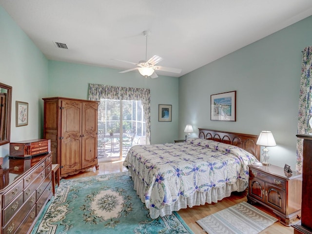 bedroom with ceiling fan, access to outside, light wood finished floors, and visible vents