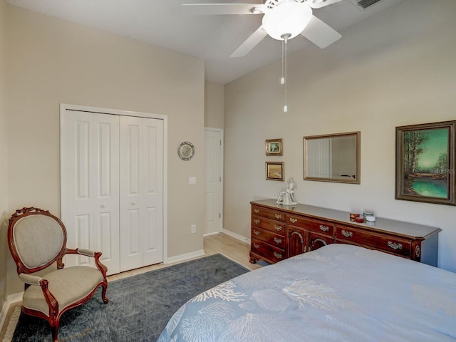 bedroom featuring a closet, ceiling fan, and baseboards