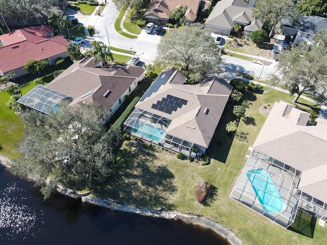 aerial view featuring a water view and a residential view