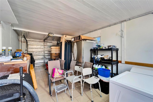 garage featuring washer and dryer