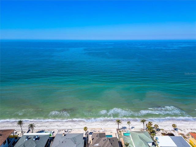 water view with a residential view and a beach view