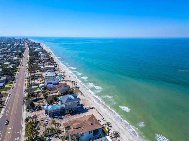 aerial view featuring a water view and a beach view