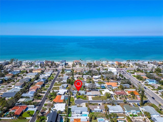 birds eye view of property featuring a water view and a residential view