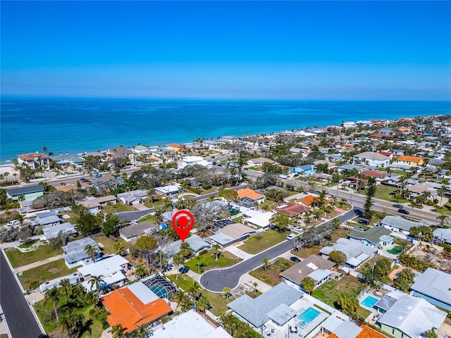 birds eye view of property featuring a residential view and a water view