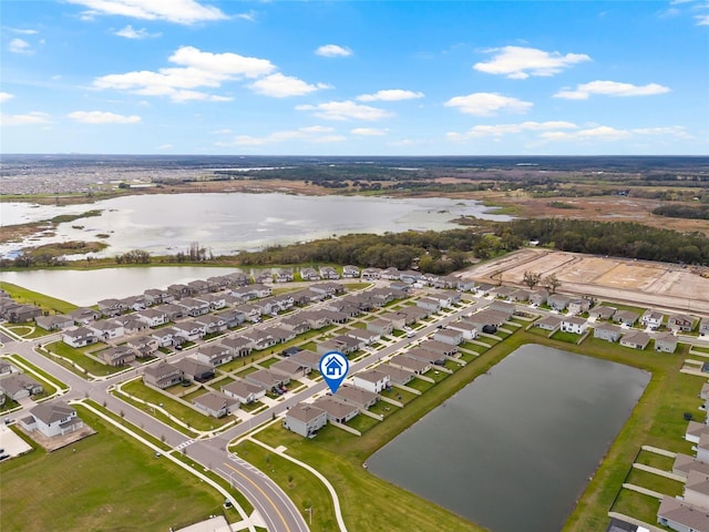 aerial view featuring a residential view and a water view