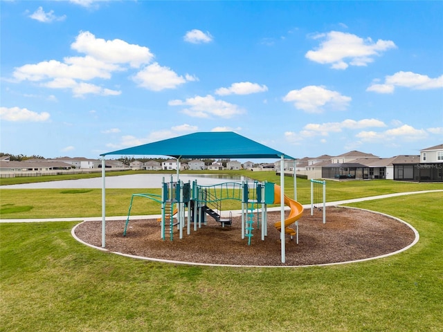 community play area with a residential view and a yard