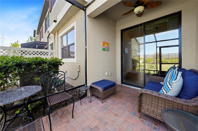 view of patio with ceiling fan