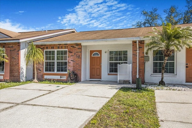 view of front of house with brick siding