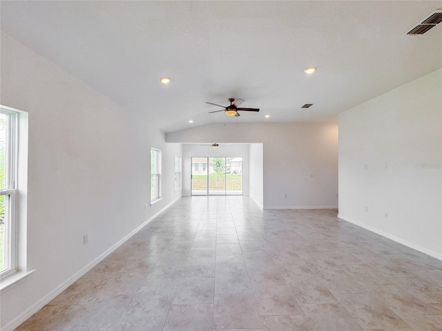 empty room with recessed lighting, visible vents, a ceiling fan, vaulted ceiling, and baseboards