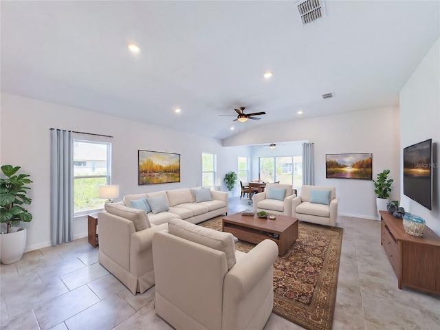 living area with plenty of natural light, visible vents, vaulted ceiling, and recessed lighting